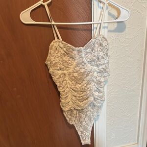 Elegant White Lace Bodysuit